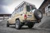 Бампер РИФ силовой задний Toyota Land Cruiser 78 2007+ с квадратом под фаркоп, калиткой и фонарями